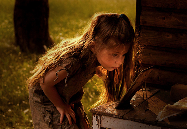 Little girl checking herself