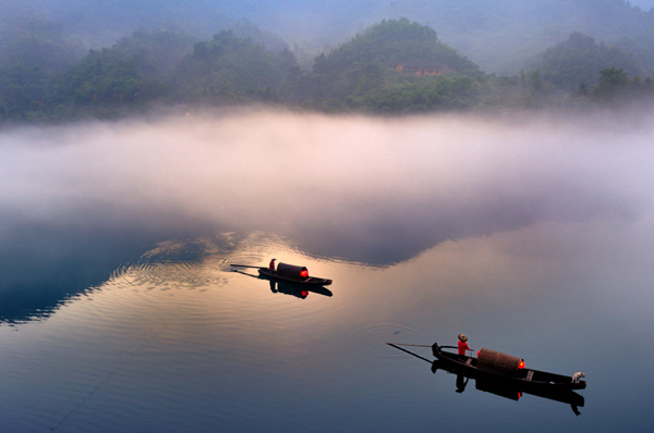 two boats on a misty morning