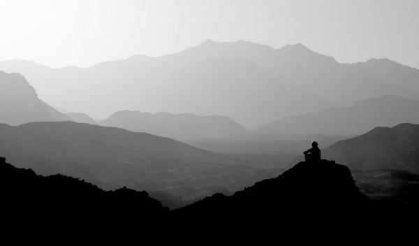 man watching over the mountains