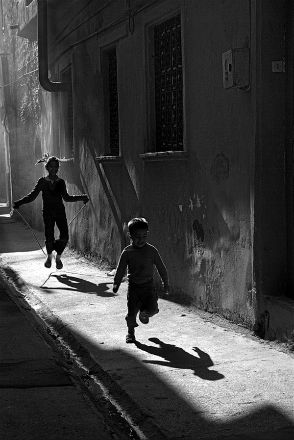two kids playing on the street
